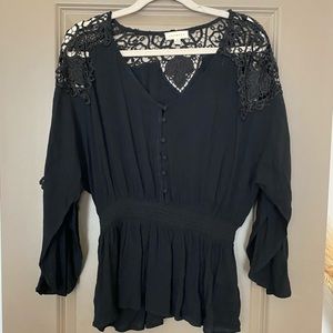 Black top, with lace and open sleeves